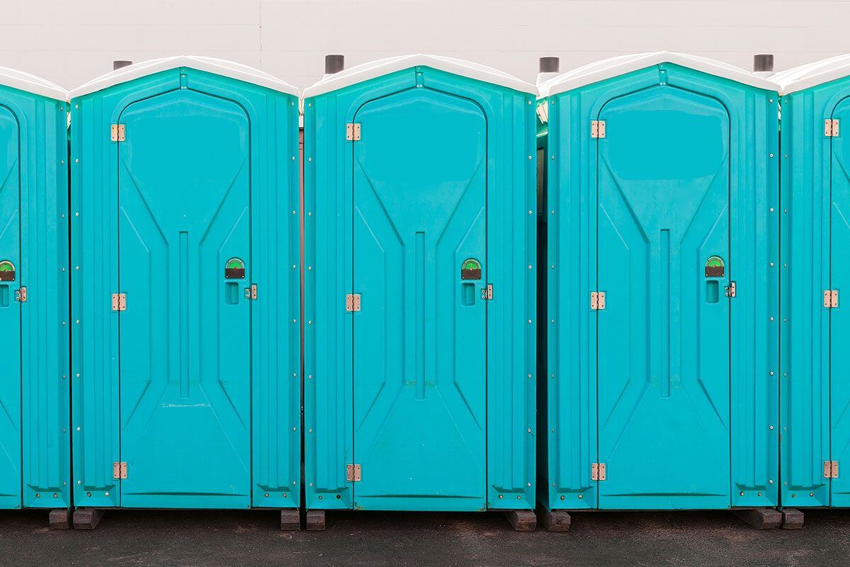 Industrial portable restroom units at a plant in Lake City, Florida
